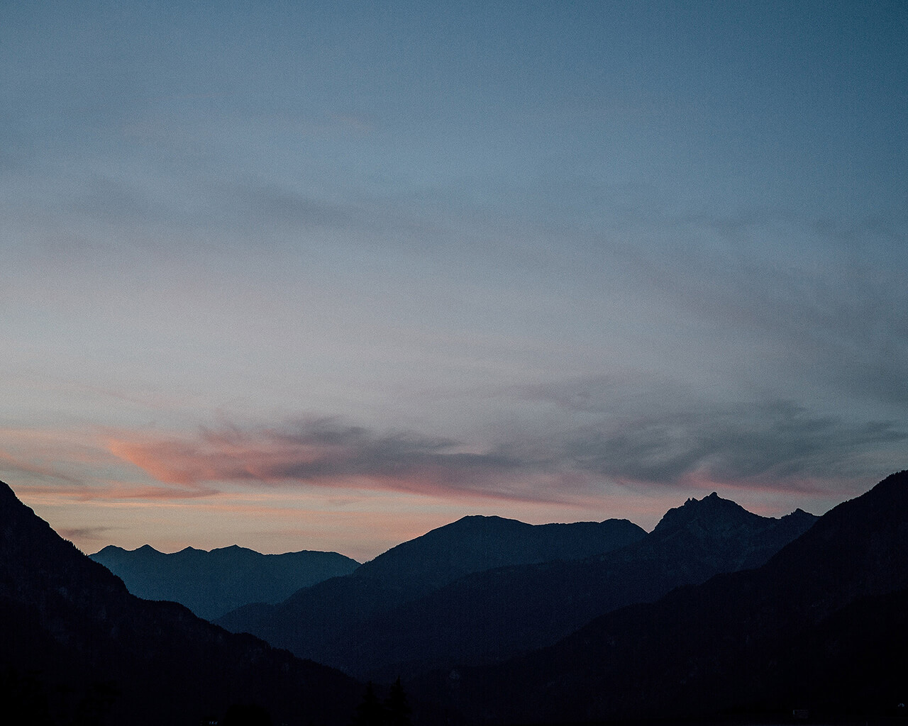 Early morning over a mountainous landscape, representing 'Design', the second step in Creative Revolution's Strategic Design methodology for creative services.