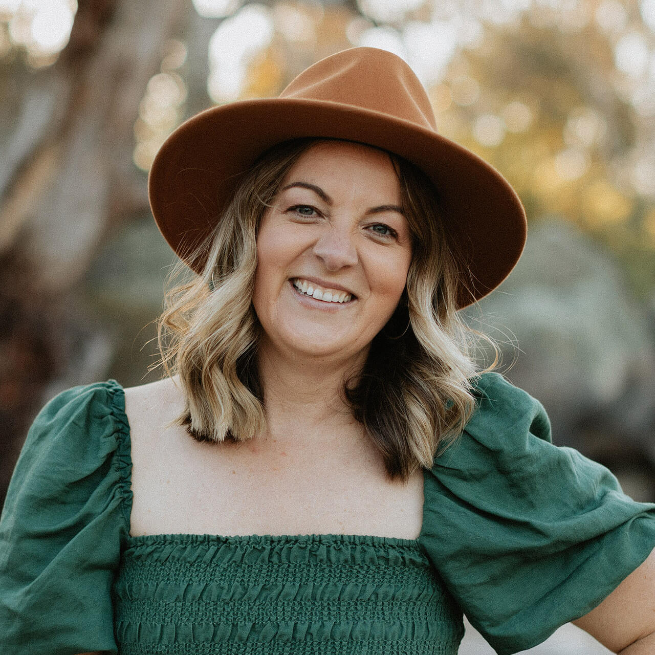 Nicole Woodcock headshot, client of Creative Revolution web design services.