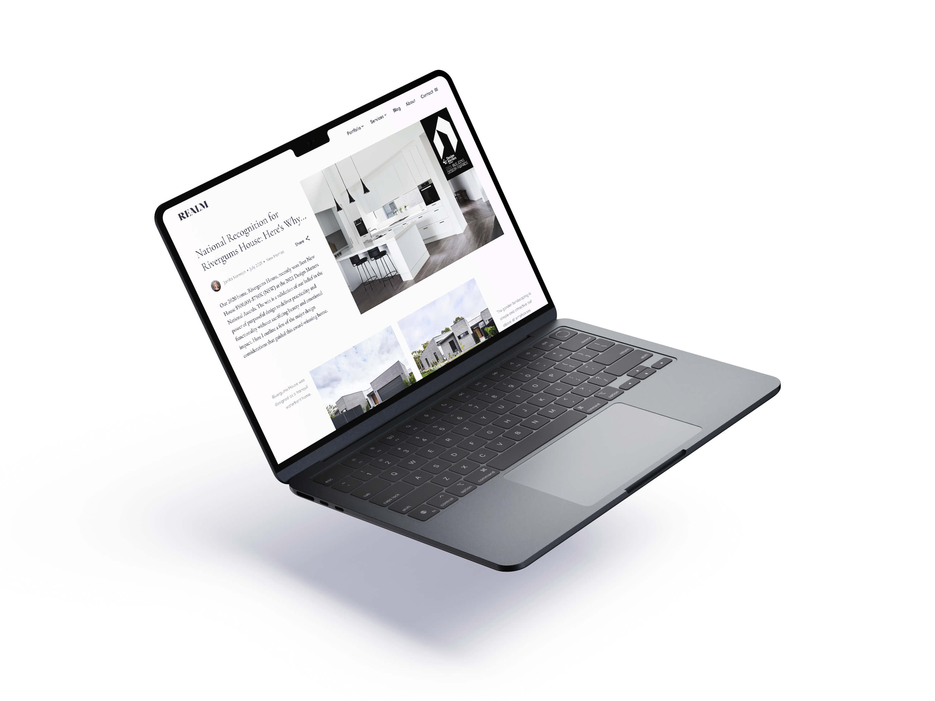 Realm Building Design Echuca website mockup on macbook laptop - blog article