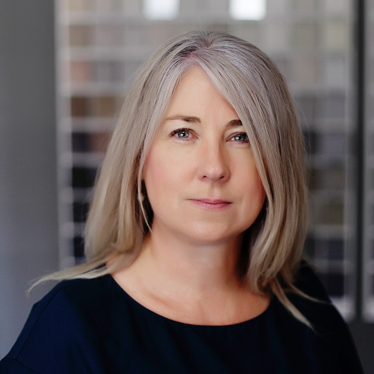 Janita Norman, Lead Building Designer at Realm Building Design and happy custom web design and digital marketing client of Creative Revolution.